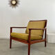 Old Scandinavian design armchair in vintage teak year 60
