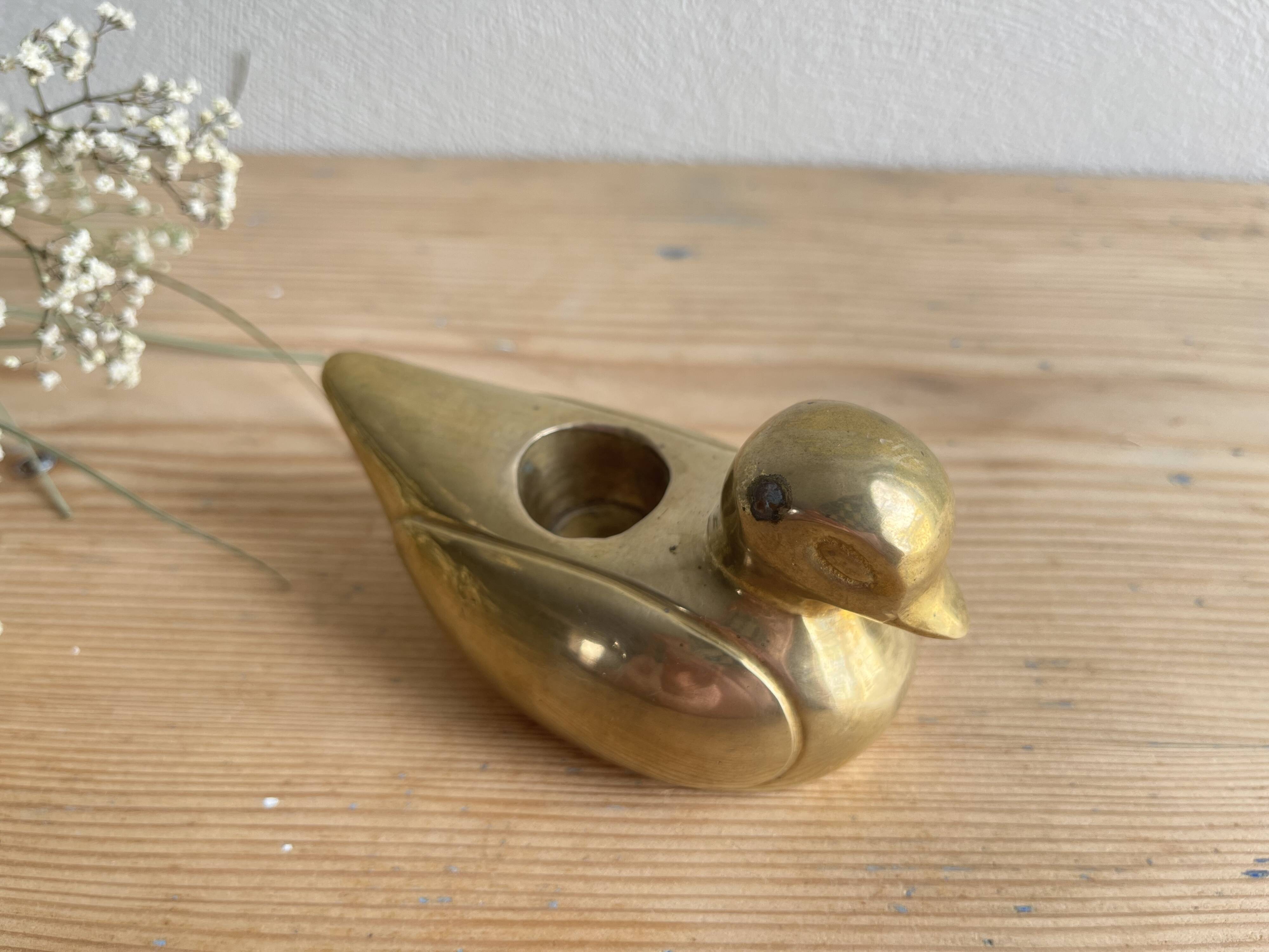 Brass duck candle holder