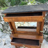 A small piece of Bonheur du jour with detached columns in Empire-era mahogany.