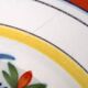 19th-century Lunéville polychrome faience plate with floral decoration.