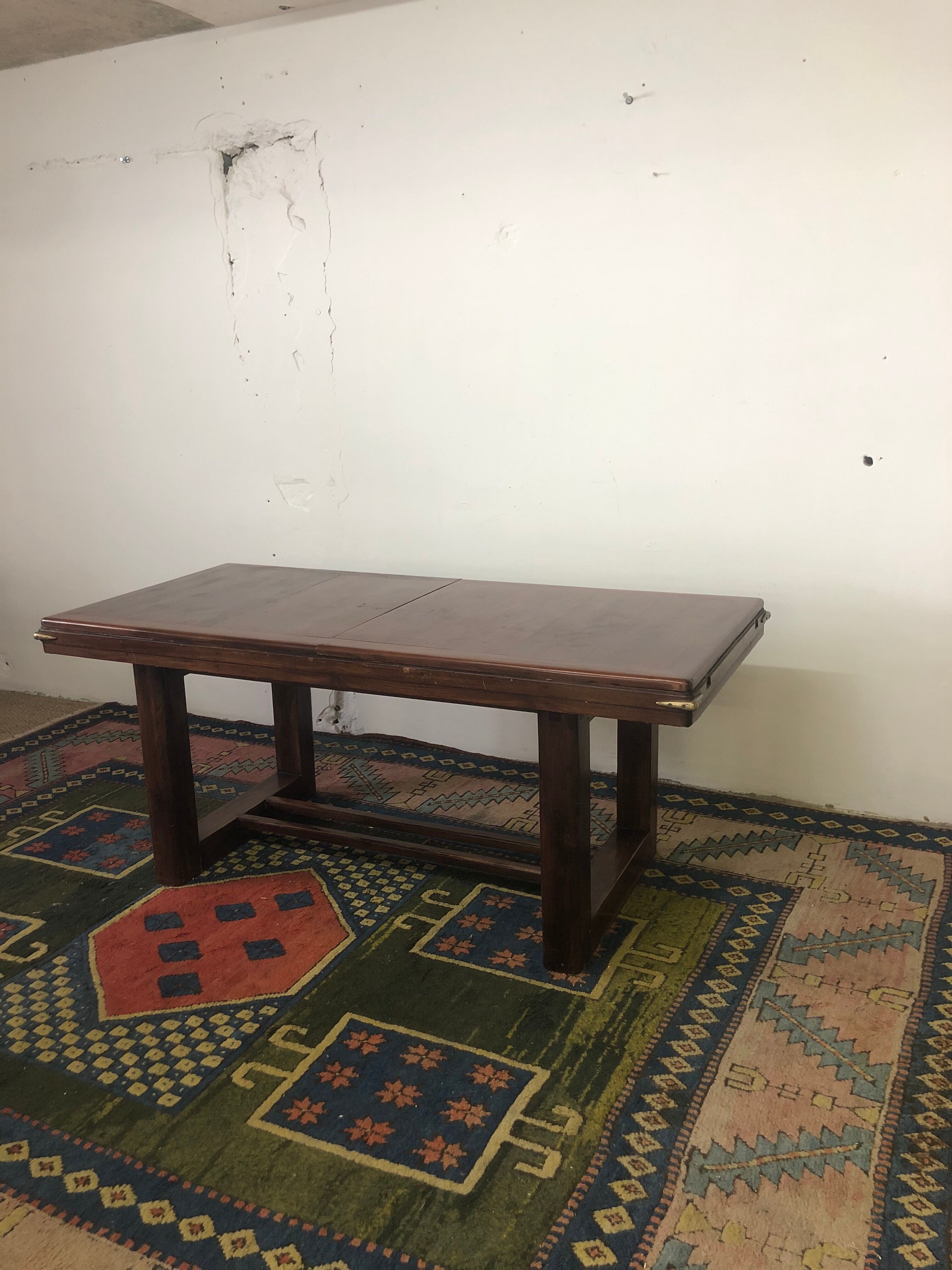 Mahogany table with brass angles