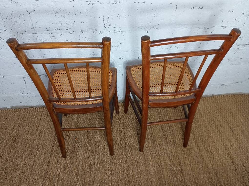 pair of caned bistro chairs from the 1930s