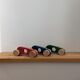 Trio de voitures de course vintage en bois