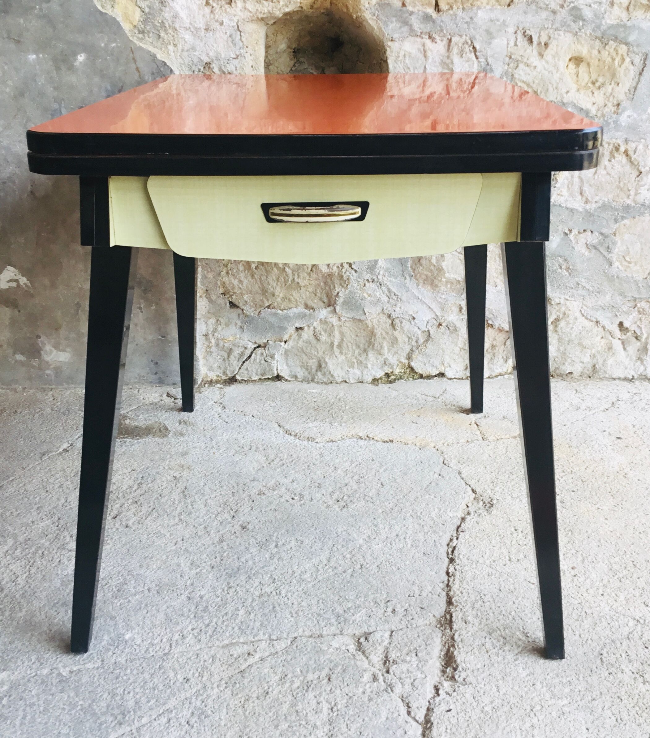 Vintage table with extension cords and orange-red formica drawers feet compass - 1960