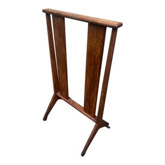 Old wooden shop rack valet casters
