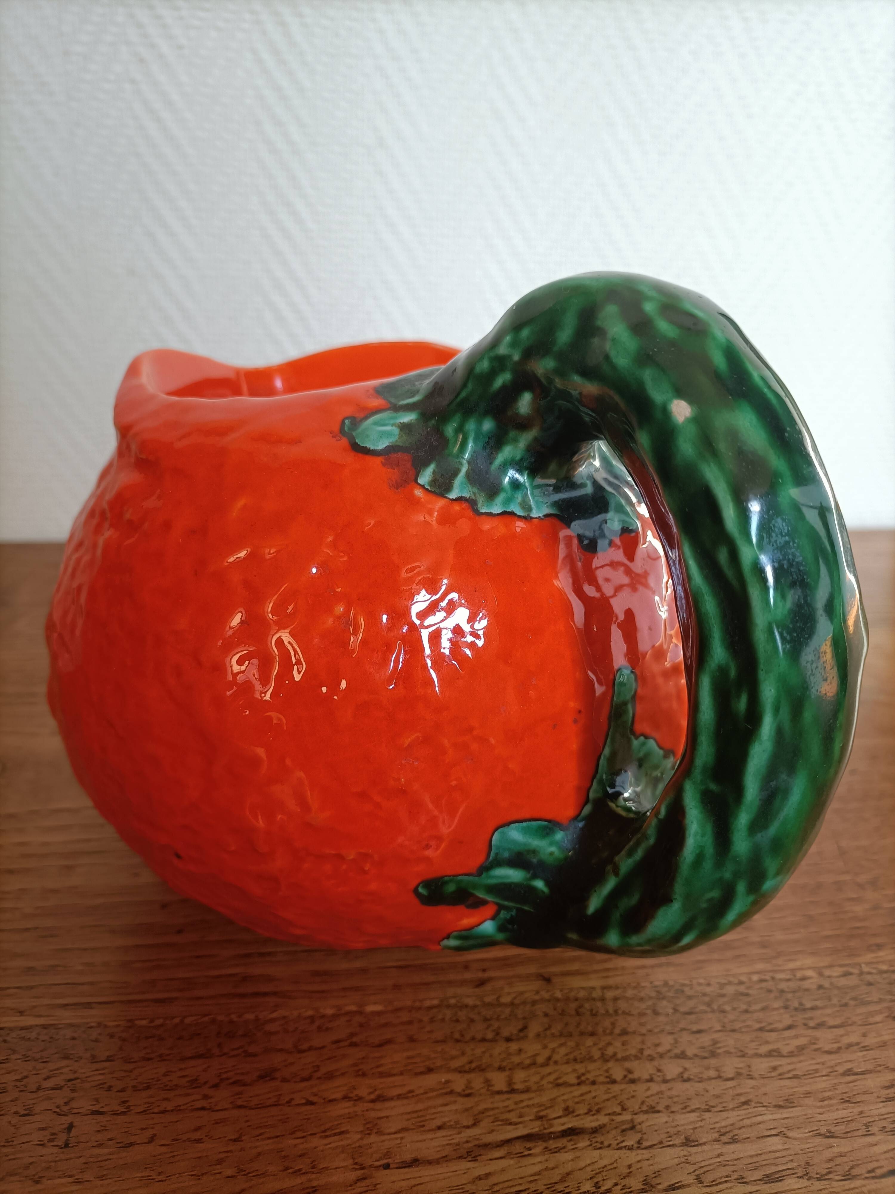 Orange pitcher in Corsican slip