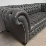 Gray leather Chesterfield sofa