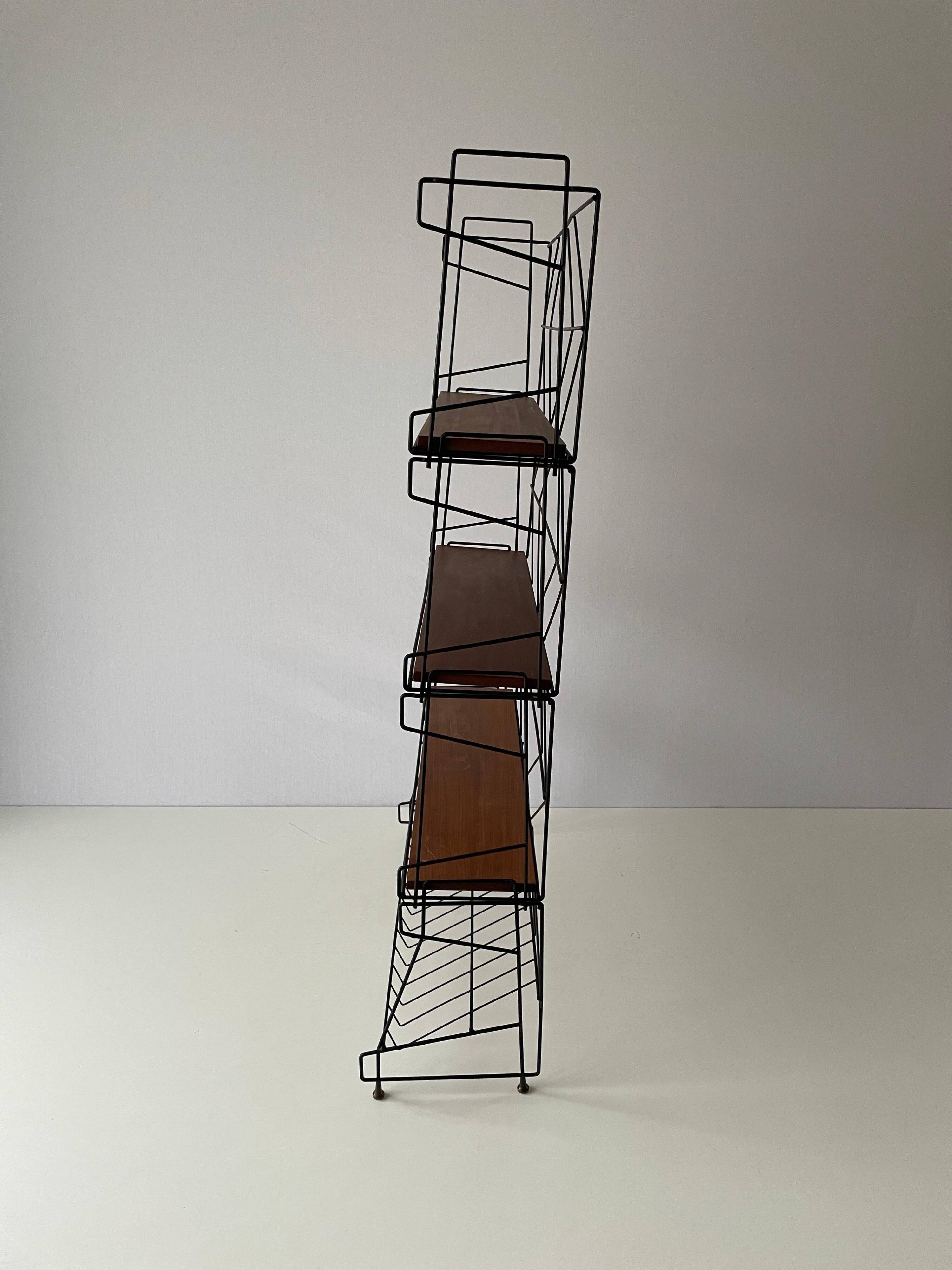 Free-standing shelf with a metal structure and 3 shelves, 1960s, Italy.