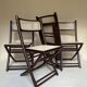 Set de quatre chaises pliantes en bois et cannage