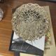 Vintage 1970s round wall light ceiling fixture with amber glass and gold.