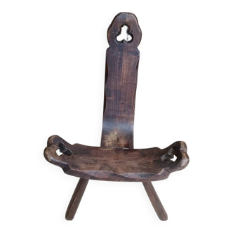 Rustic wooden tripod chair