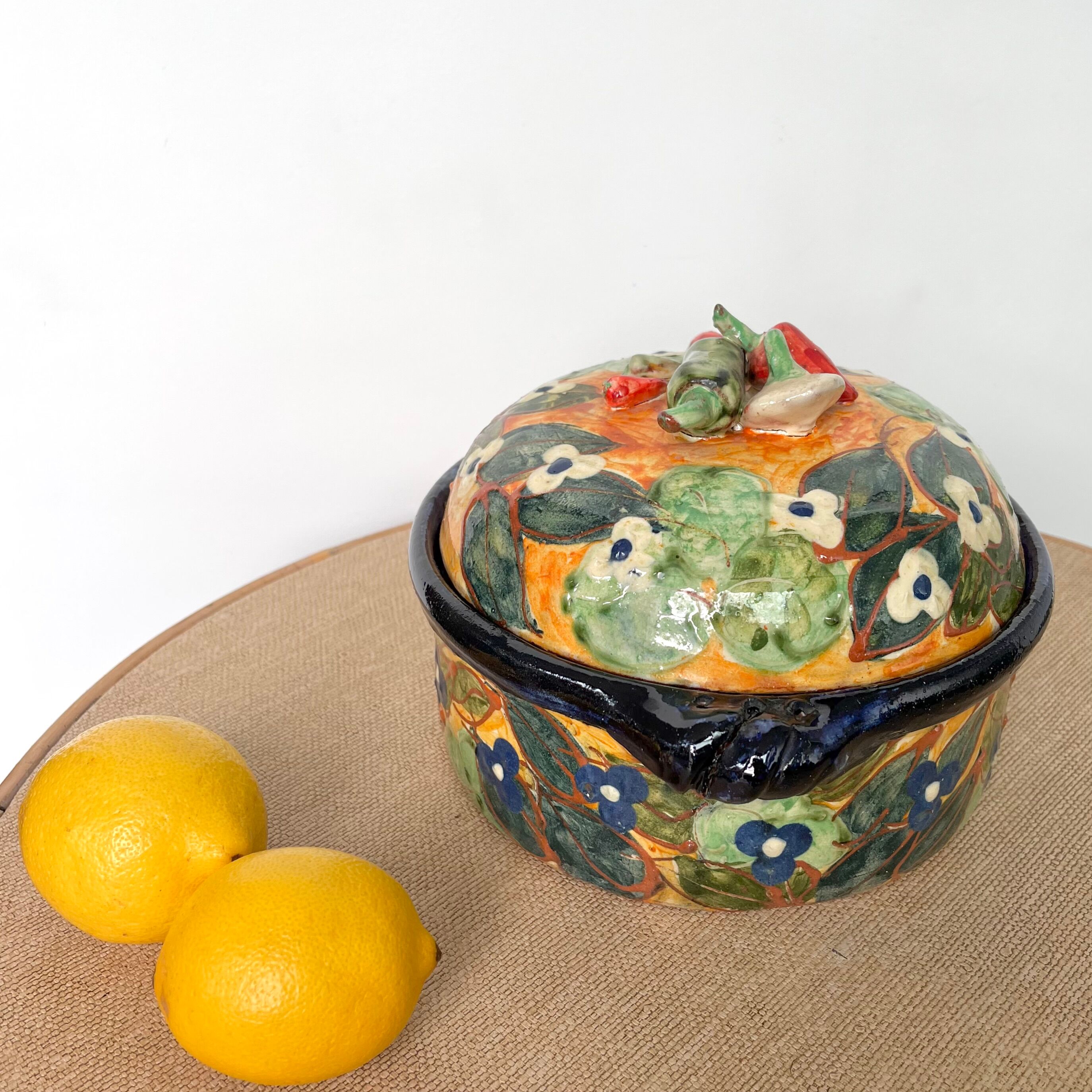 Old vegetable tureen in glazed terracotta