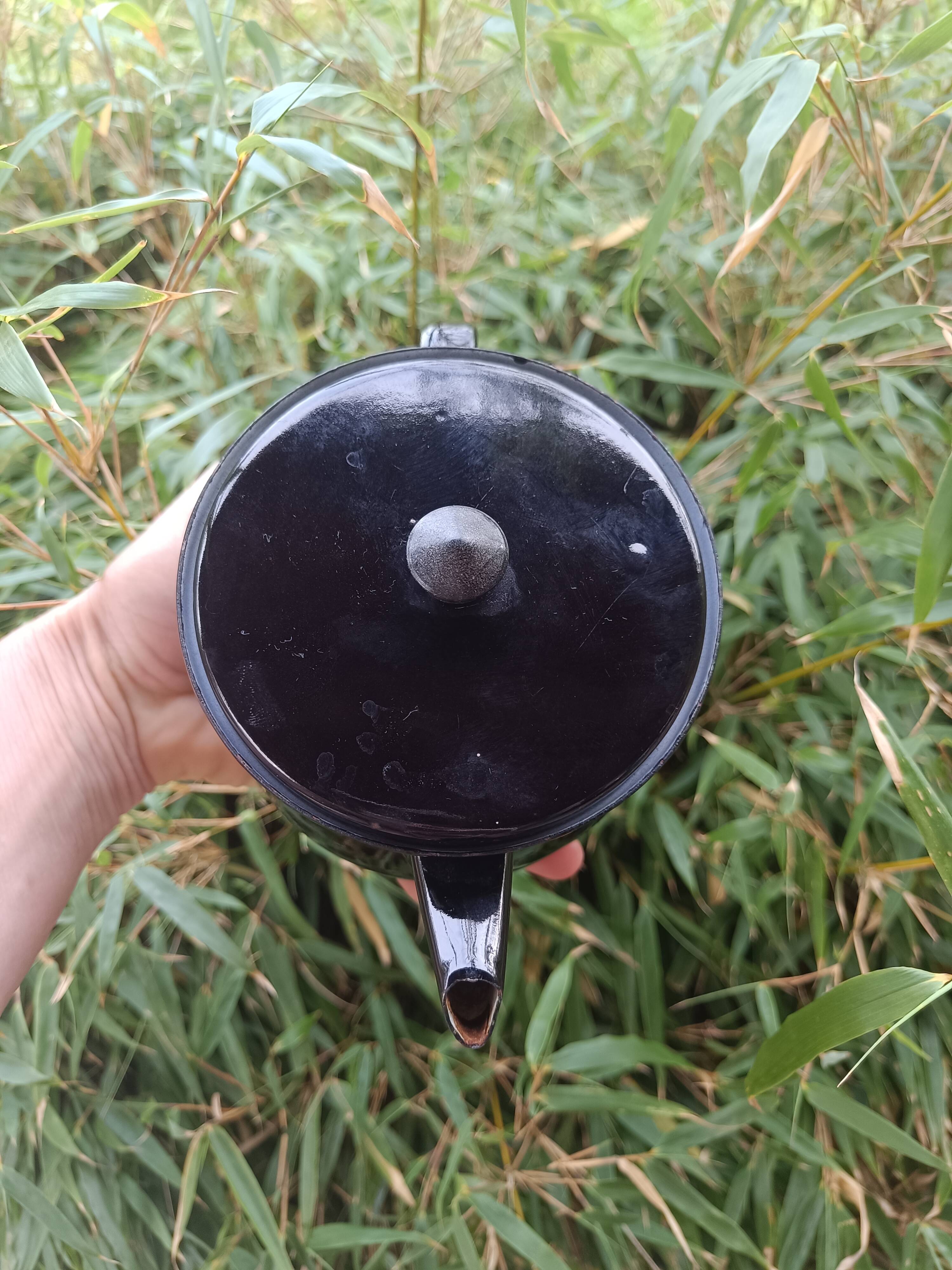 Enamelled tin teapot
