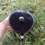 Enamelled tin teapot