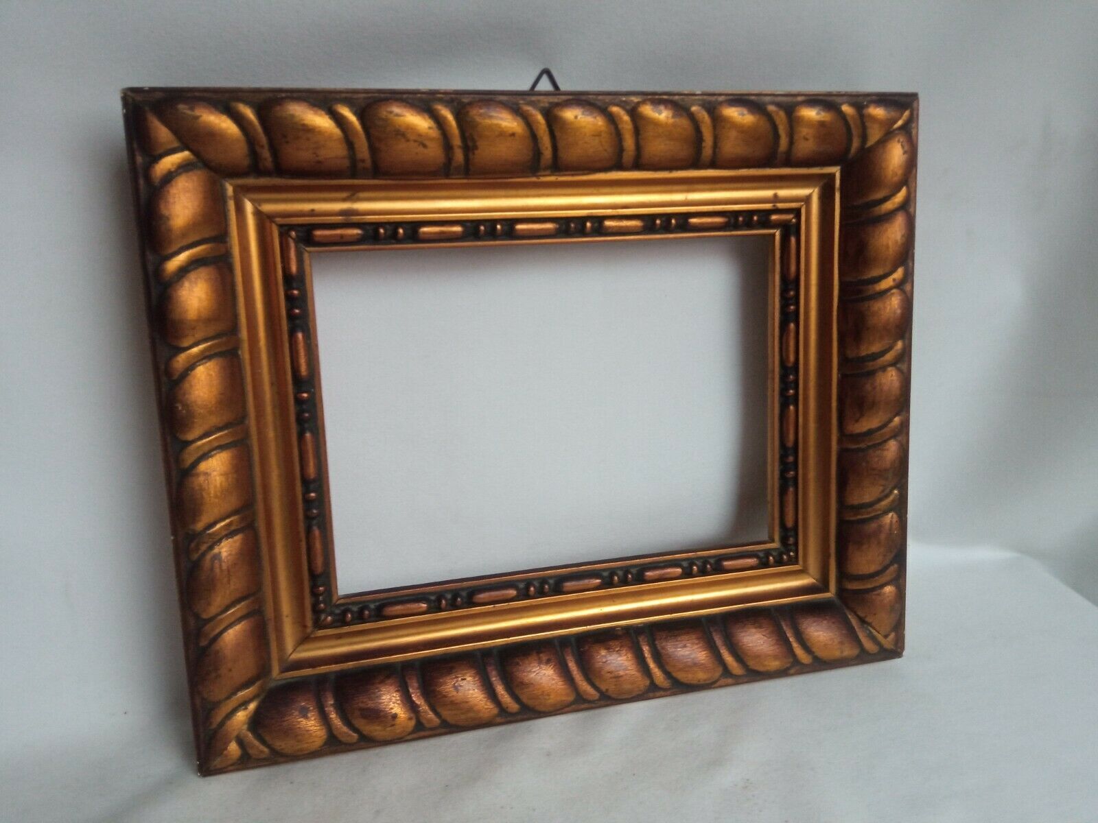 Wooden frame and gilded stucco circa 1900