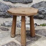 Raw wood tripod stool with octagonal seat