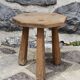 Raw wood tripod stool with octagonal seat