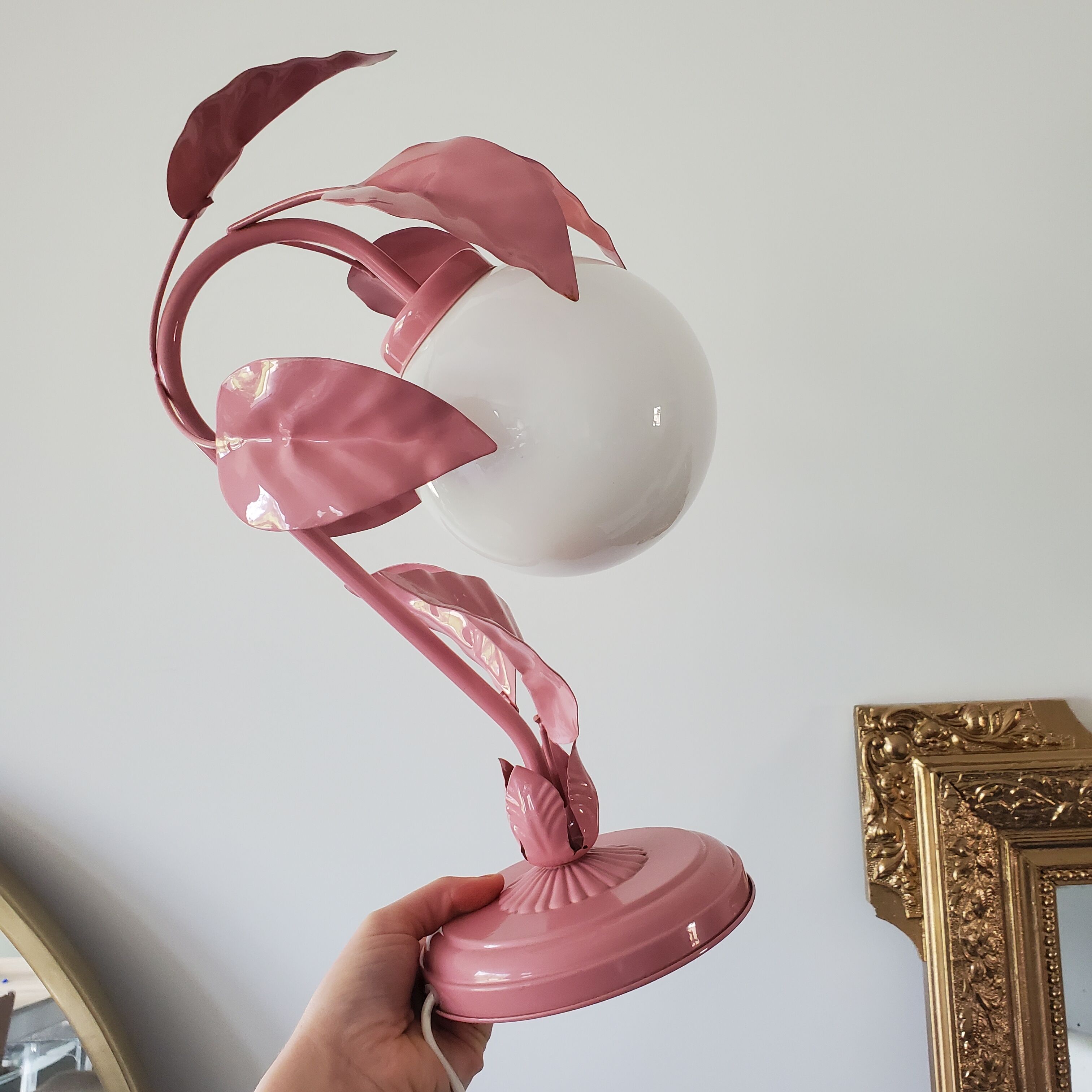 Opaline bedside lamp and pink leaves