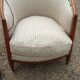 Paire de fauteuils et pouf Louis XVI