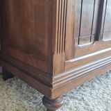 Antique Parisian glass cabinet in the style of a hosier