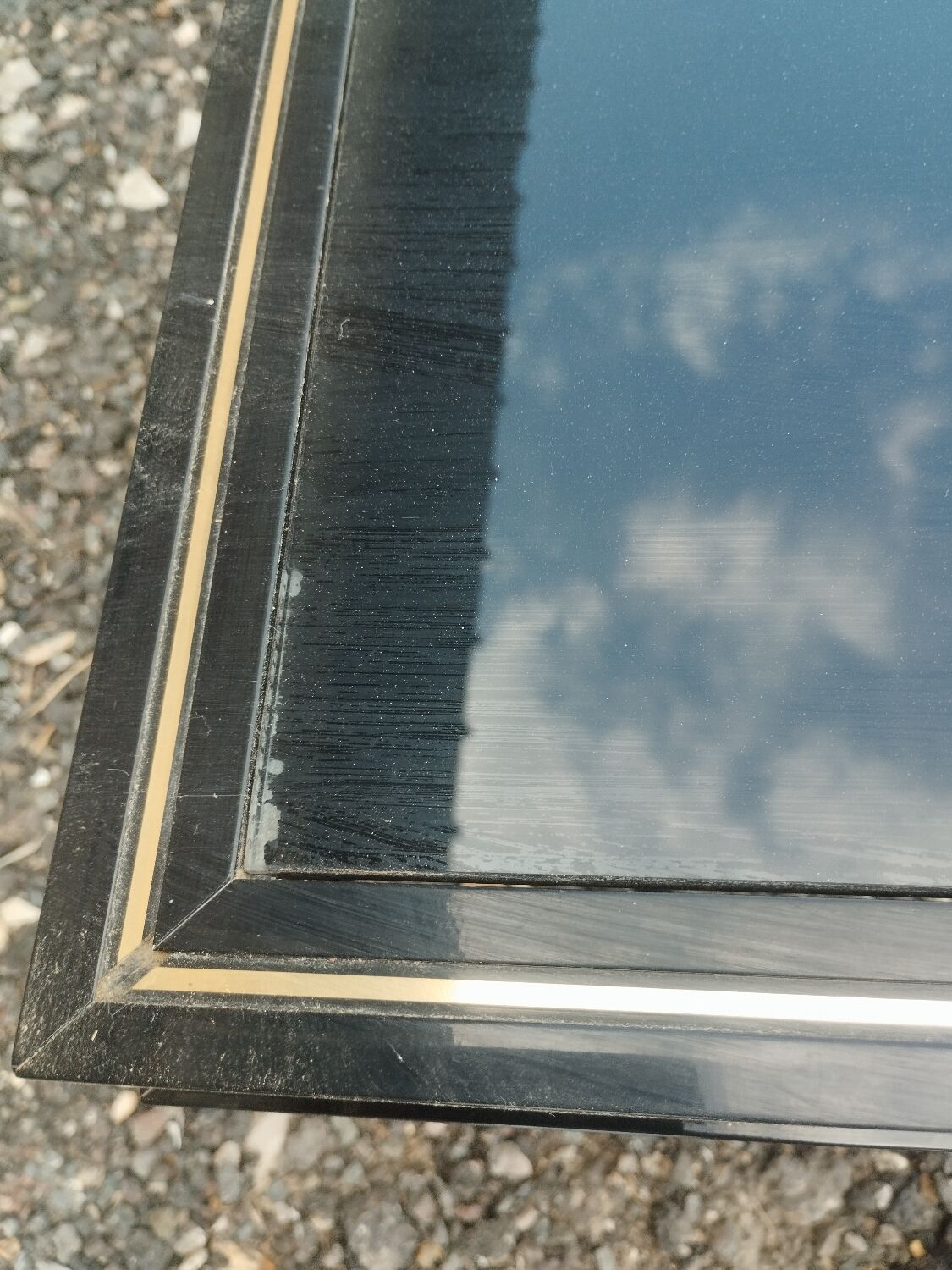 Vintage metal coffee table with glass top.