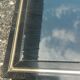 Vintage metal coffee table with glass top.