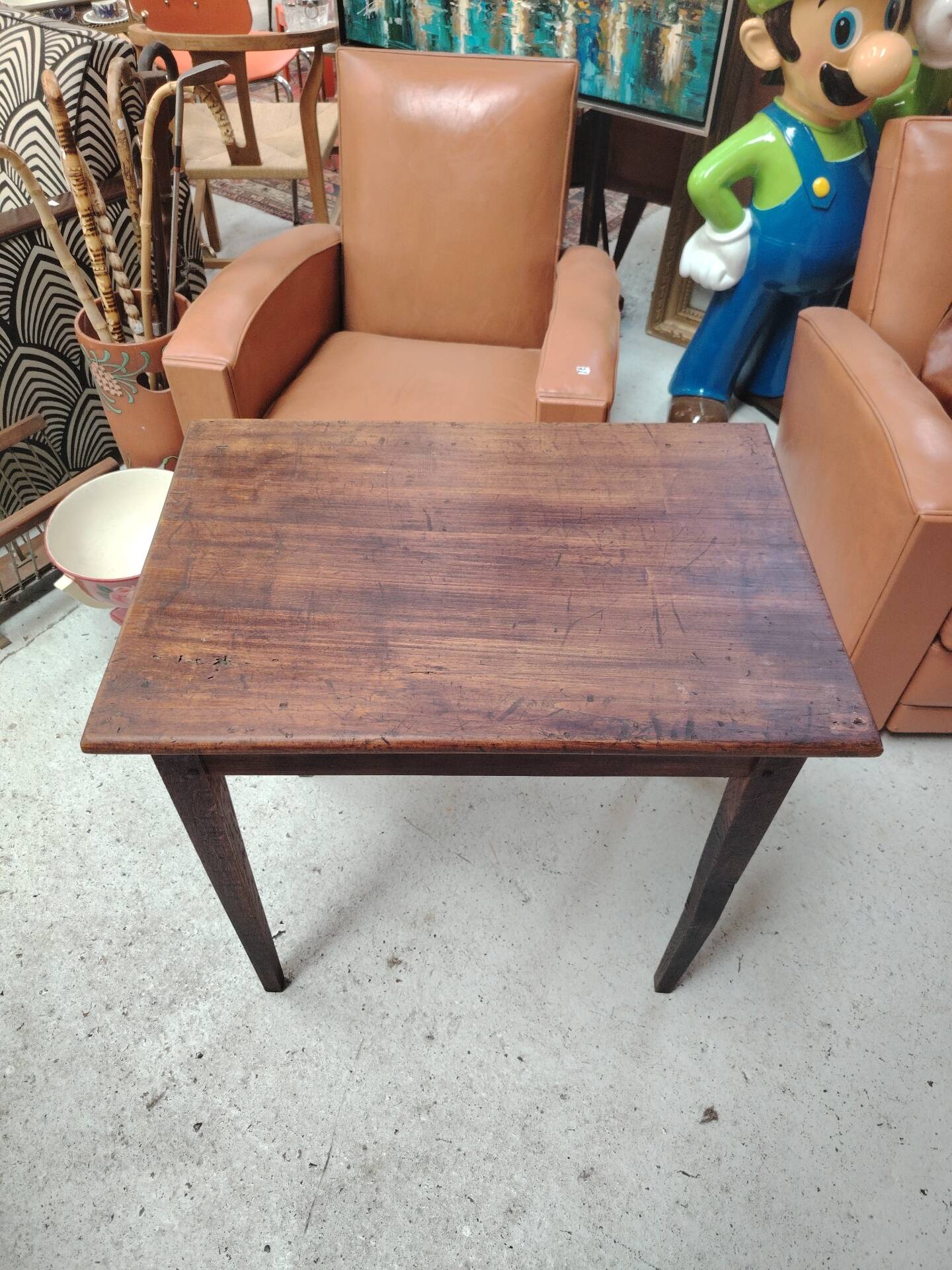 Small patinated solid wood side table with tapered legs - 1900
