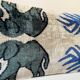 Coussin Ikat en velours éléphants persans