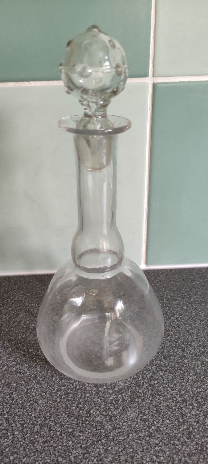 Antique decanter with its original cap