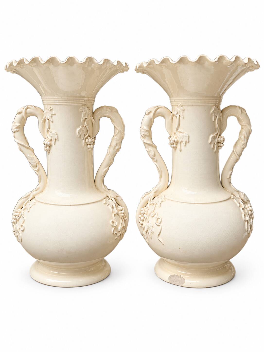 Pair of fine cream earthenware vases from Langeais, decorated with vine.