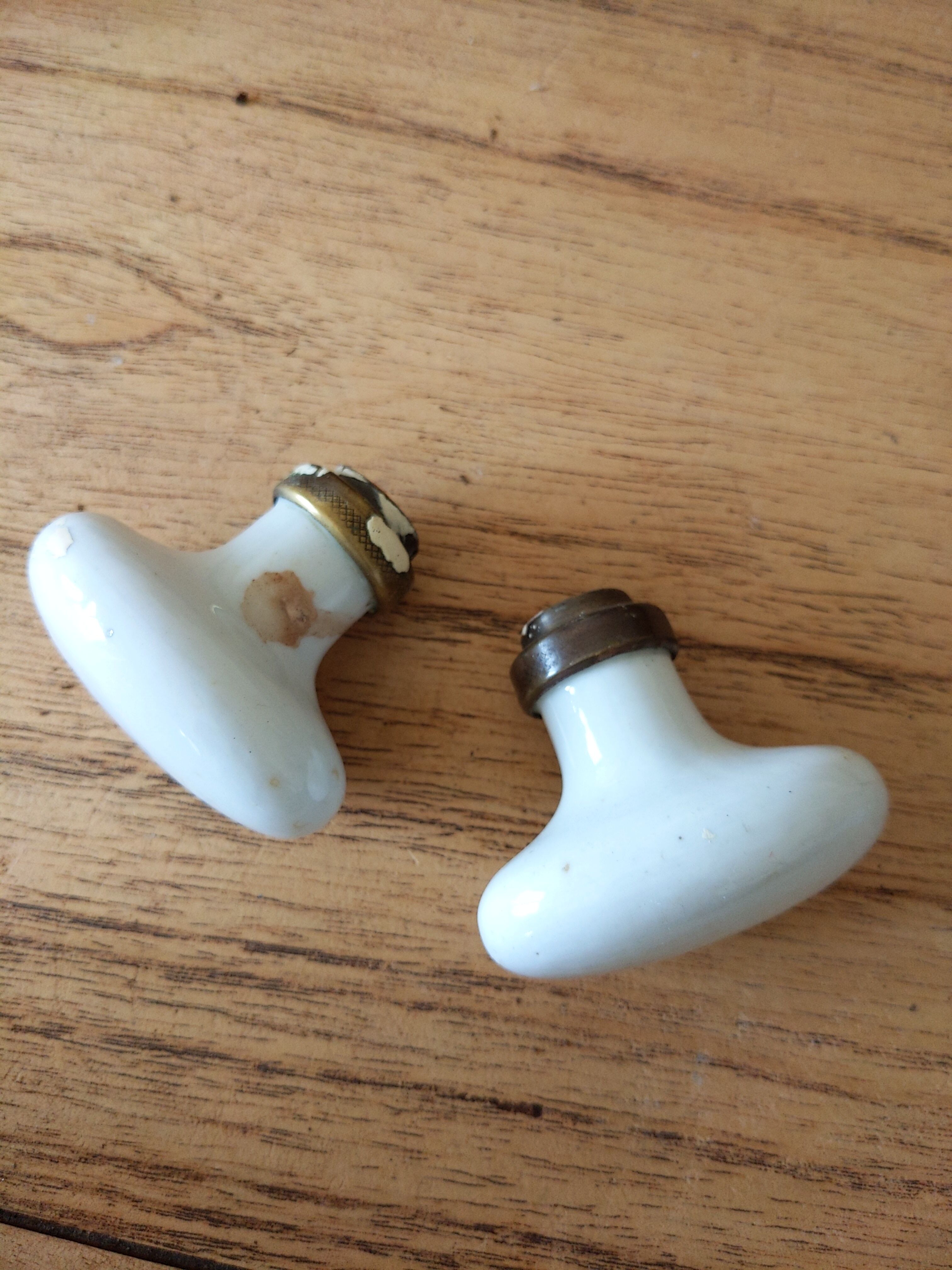 Vintage antique door handle in porcelain and brass