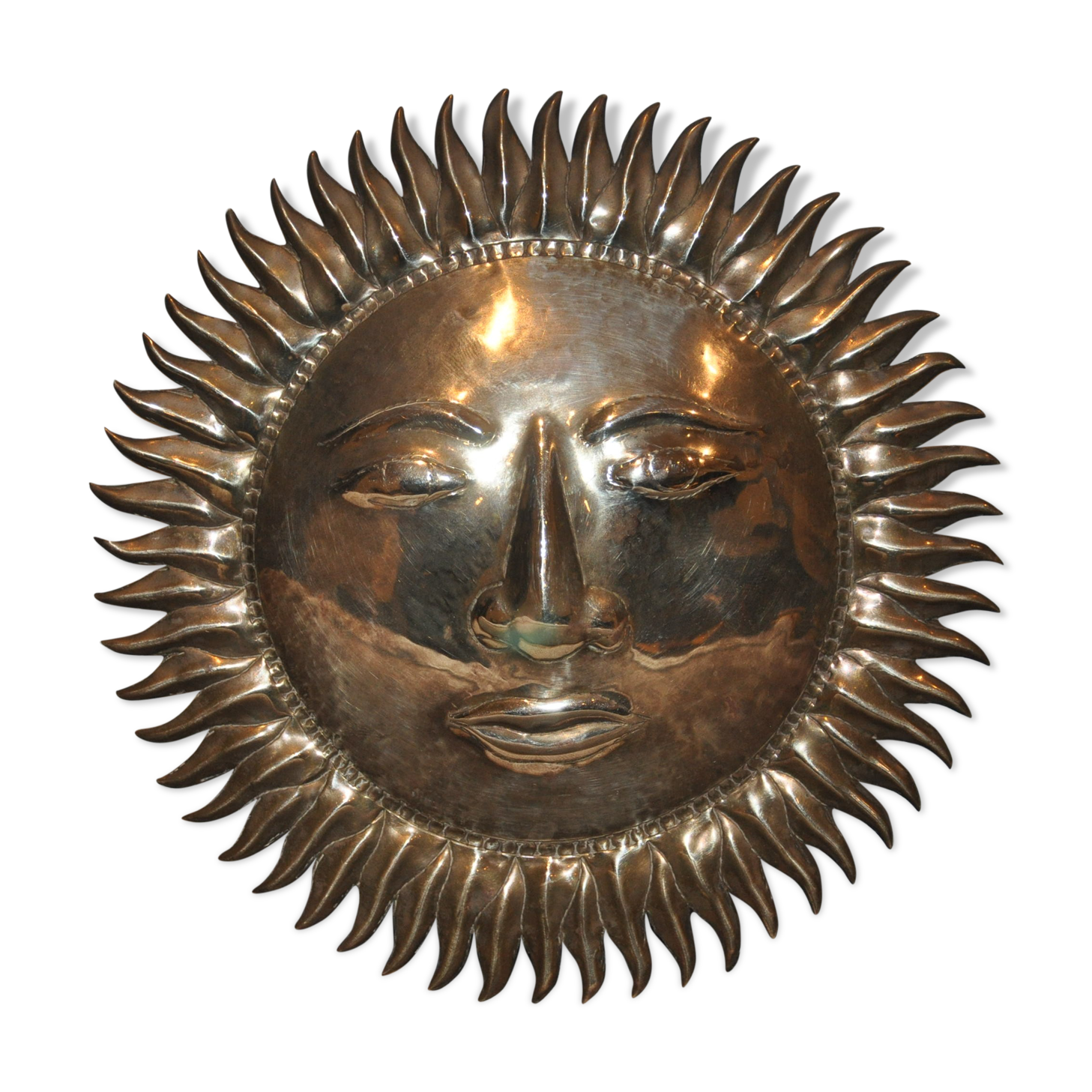 Vintage brass sun