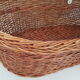 Old rattan bassinet and bedding