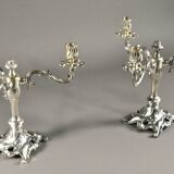 Pair of three-armed silver-plated metal candelabras