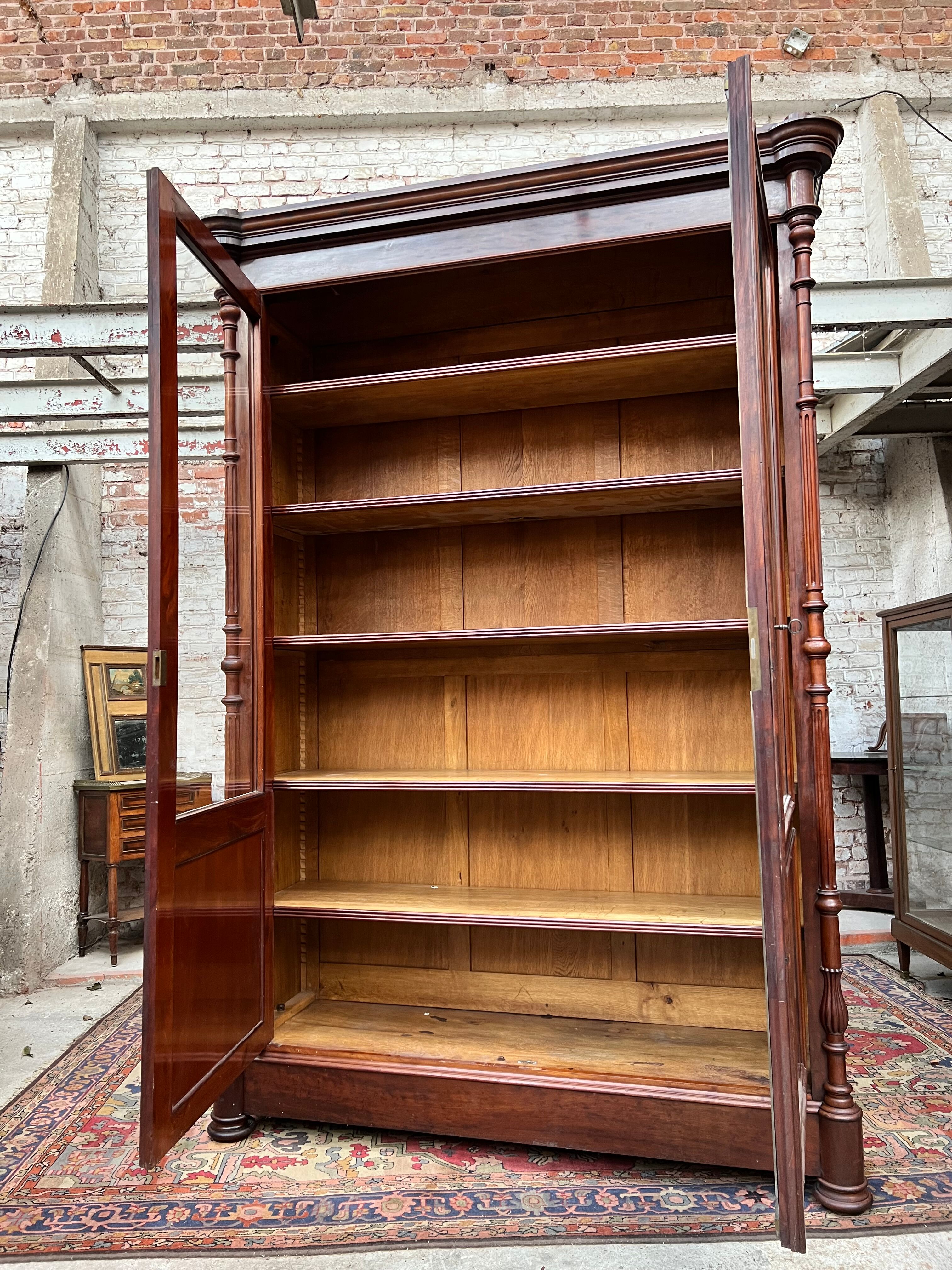 Speckled mahogany bookcase of Napoleon III XIX century