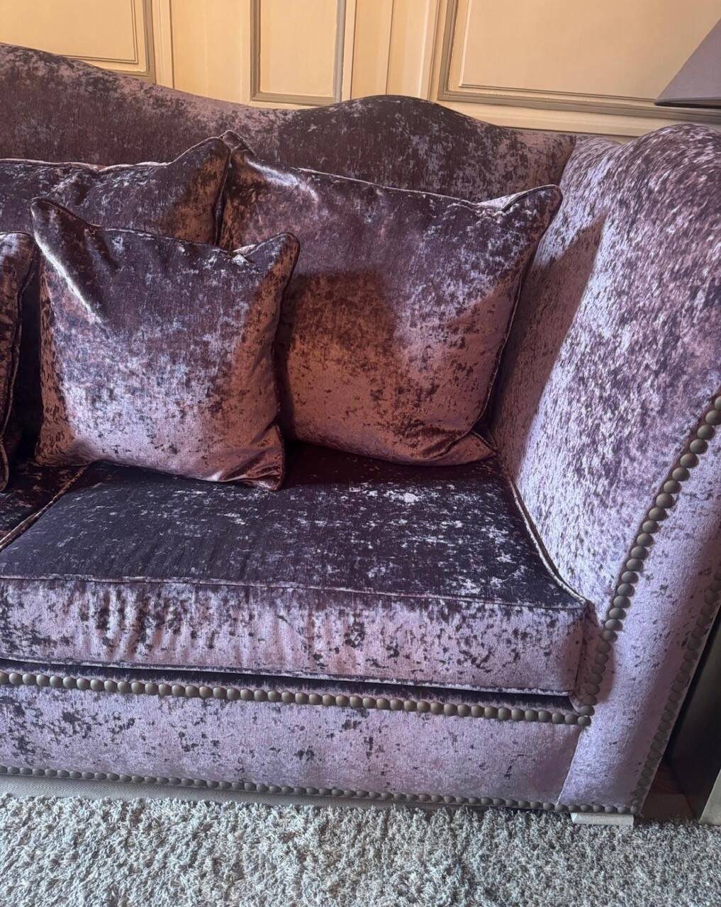 Purple velvet sofa