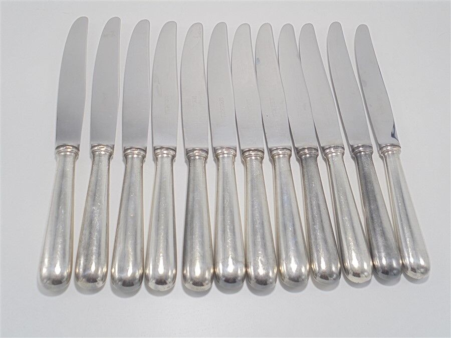 Series of 12 silver knives