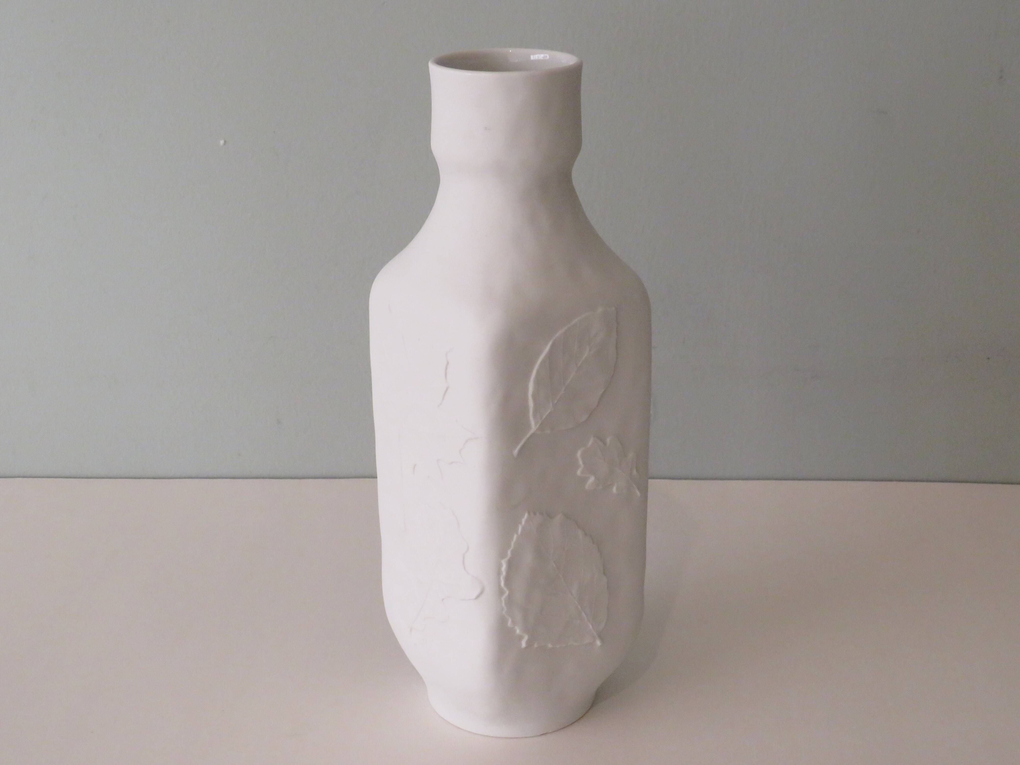White biscuit vase with floral motif in relief, Hutschenreuther, Germany 1970