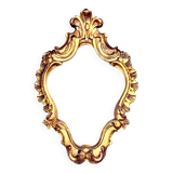 Rococo wall mirror in golden resin