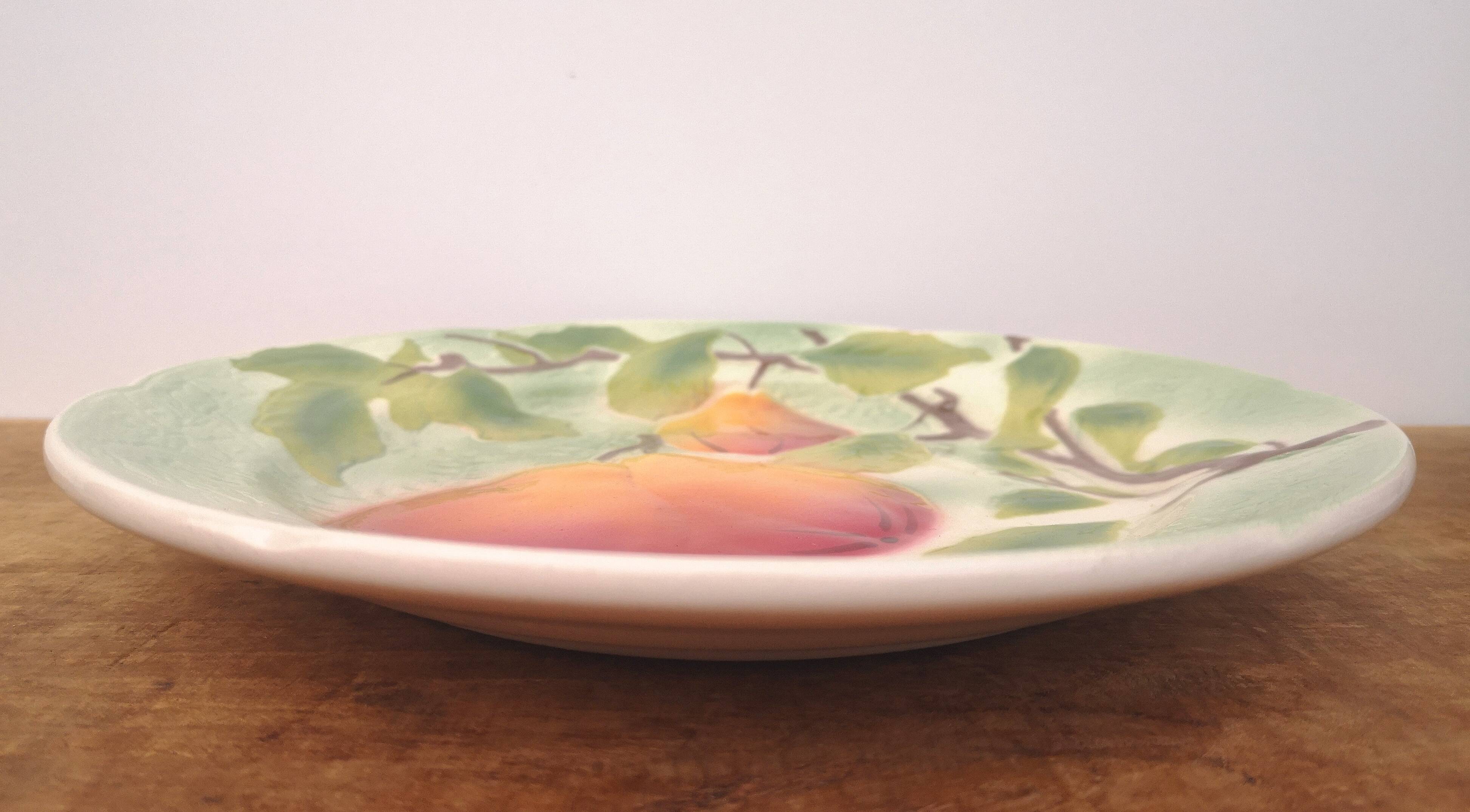 Old dessert plate in barbotine, St Clément factory