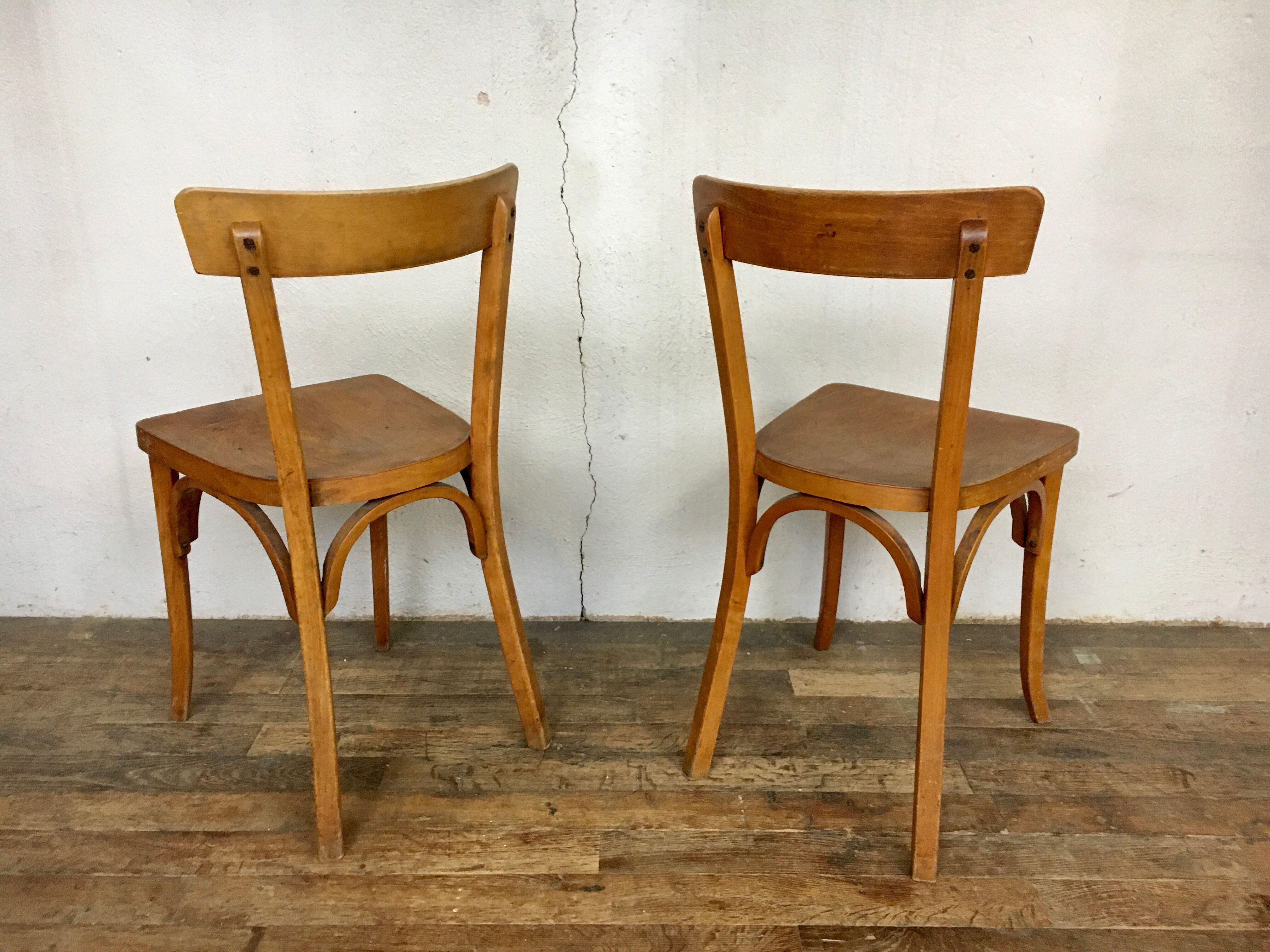 Pair of vintage clear beech baumann chair