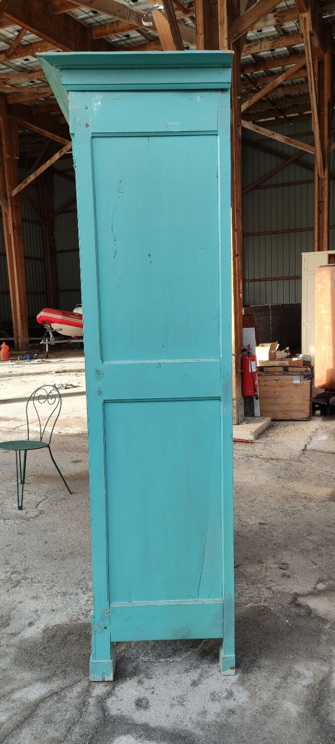 Antique patinated two-door cabinet