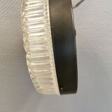 Ceiling light, in dark metallic paint with thick glass shade with beautiful details in the glass.