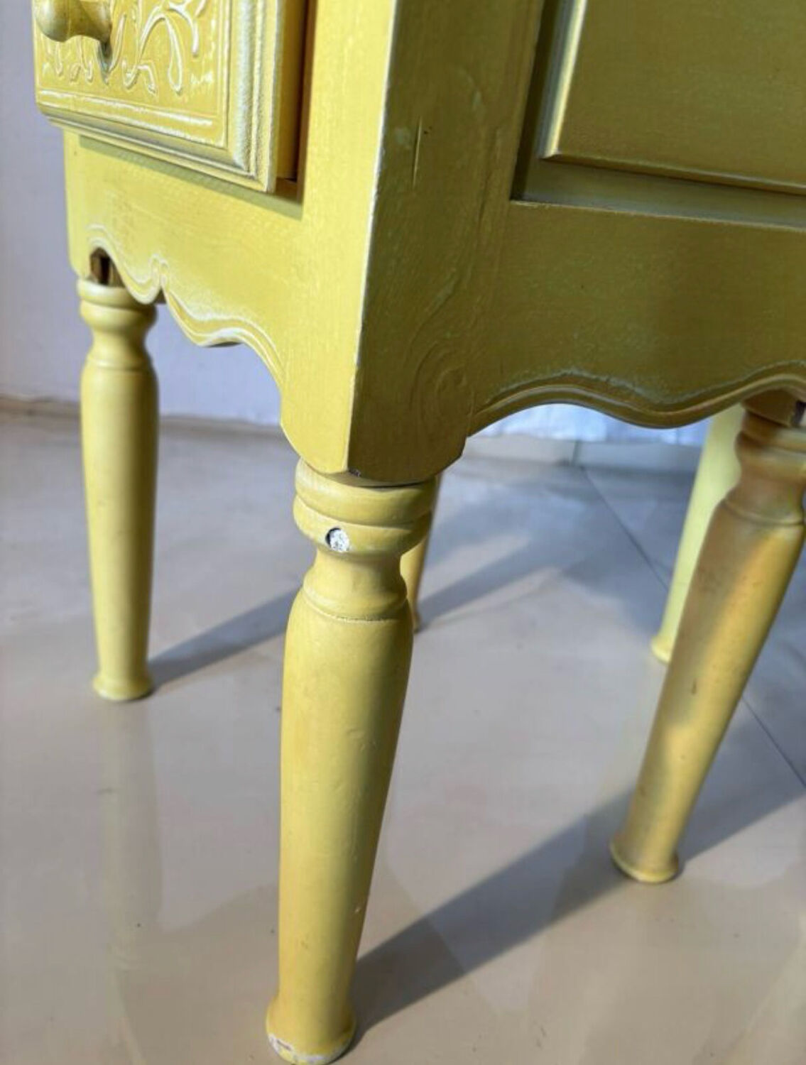 Pair of vintage carved wooden bedside tables.
