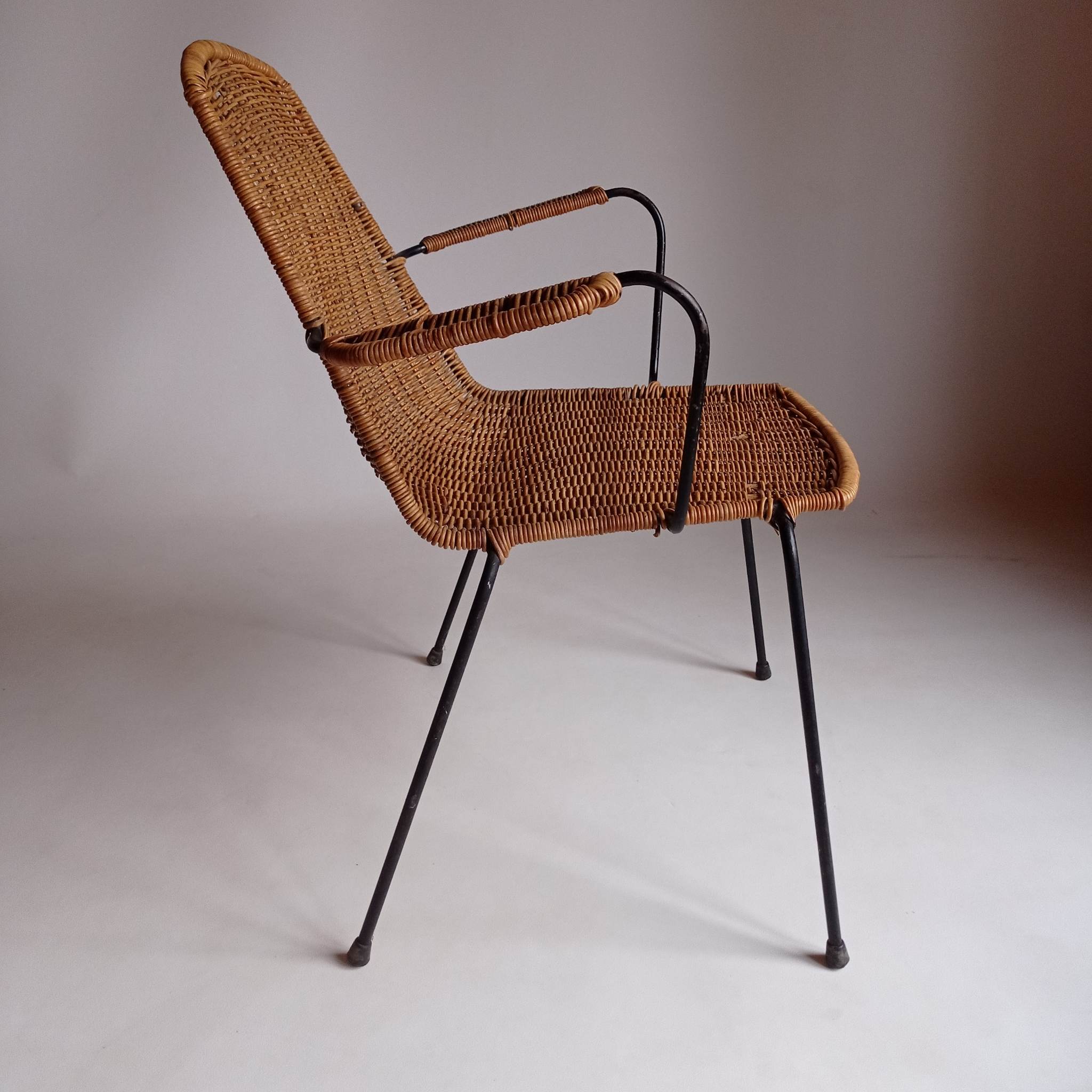 Wicker chair with Campo and Graffi armrests from the 60s.