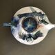 Glazed terracotta teapot