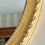 Gilded mirror with pediment