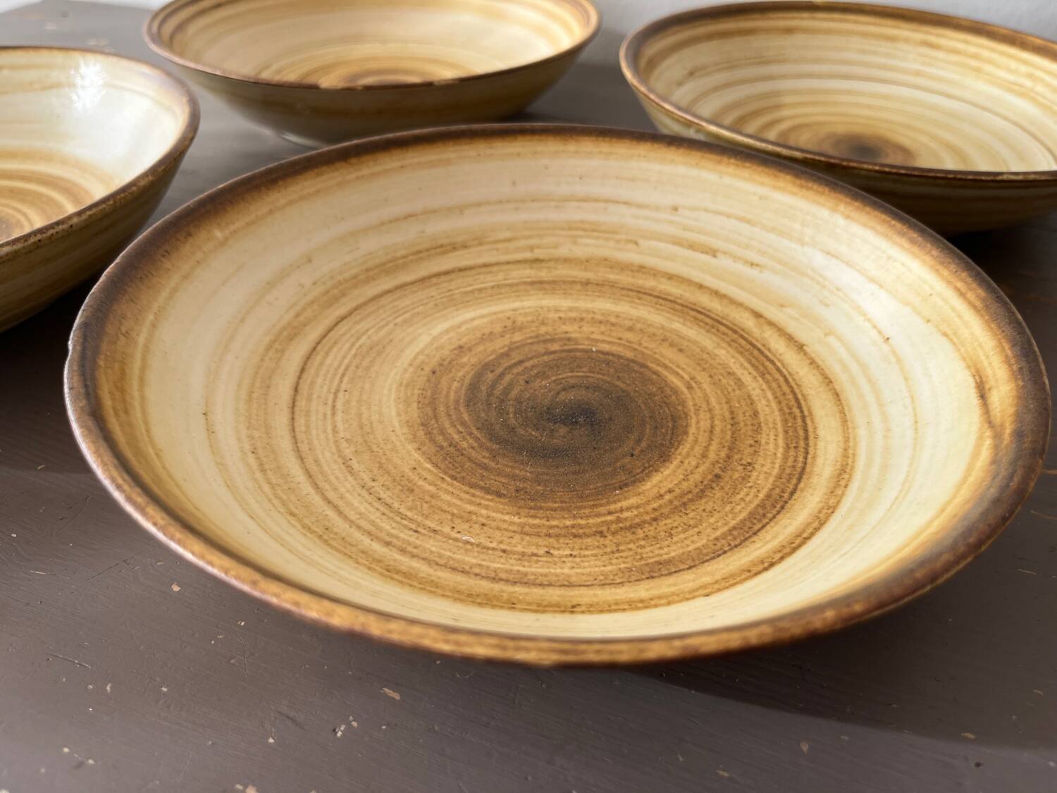 Lot de 4 assiettes creuses signées Longchamp