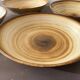 Lot de 4 assiettes creuses signées Longchamp