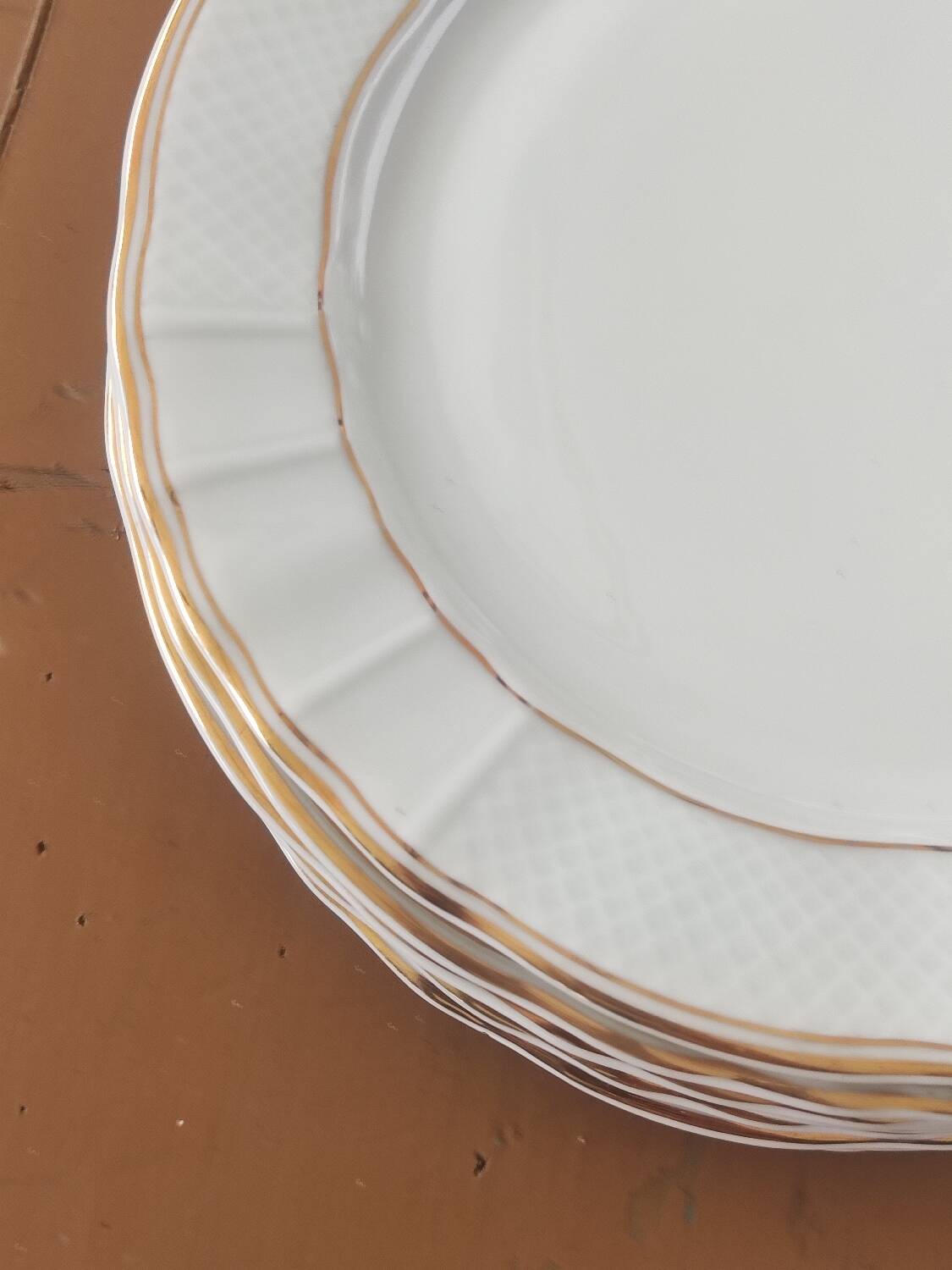 Ten Limoges porcelain plates B et Cie